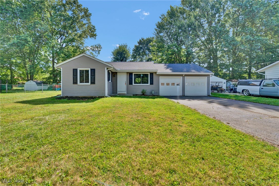 Welcome to this beautifully renovated 3-bedroom ranch in the highly desirable North Ridgeville community! This home has been completely updated inside and out, featuring a brand-new kitchen, full bathroom, roof, windows, and stylish finishes throughout. Step inside to find rich hardwood flooring that flows through the main living spaces, complemented by a modern tile shower that adds a touch of luxury to this classic home. The open, functional layout offers comfort and ease for everyday living or entertaining. Nestled in a quiet, established neighborhood, this move-in-ready home combines quality craftsmanship with timeless charm. Don’t miss your opportunity to own this North Ridgeville ranch!