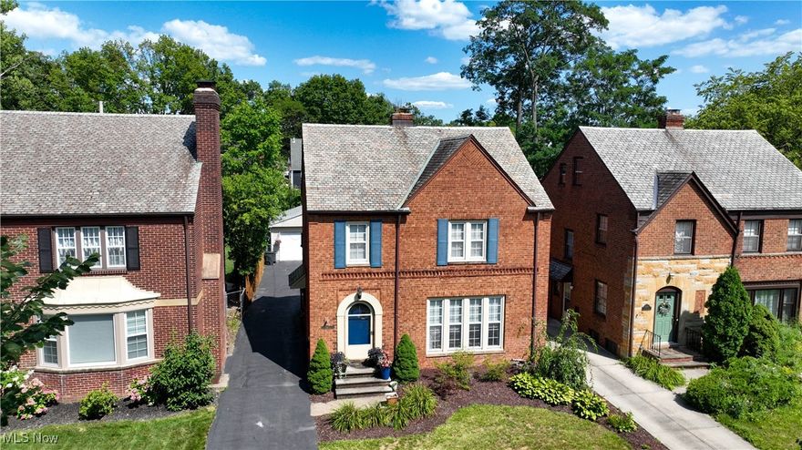 This beautifully maintained brick home in University Heights offers the perfect blend of comfort and style. With its neutral colors, original wood floors, and abundant natural light, this home is sure to impress.

Inside, you'll find a spacious living room featuring a whitewashed brick fireplace with a wood mantel, ideal for cozy evenings. The dining room is perfect for entertaining, and there's a bonus room off the back, perfect home office or living room. The recently updated kitchen boasts white shaker-style cabinets, stainless steel appliances, quartz countertops, and subway tile backsplash, along with a charming breakfast nook.

Upstairs, the master bedroom features two closets, while the other two bedrooms offer ample space. The updated hall bathroom includes a tub/shower combination and built-in storage. For additional storage, there's an unfinished third floor. The partially finished basement provides a versatile space for a home office or entertainment area.

Outside, enjoy the privacy of a younger 2-car garage and a wood deck. This home also features newer replacement windows, a slate roof, central air, and a new furnace.

Conveniently located near shopping, dining, and University Circle, this well-loved home offers a truly delightful living experience.

To be fair to all parties, sellers reserve the right to not respond to offers until the property has been on the market for five days.