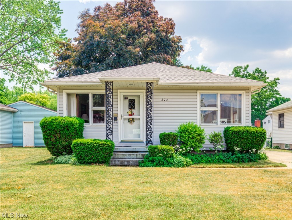 Nice ranch situated in a neatly manicured and highly desirable Cuyahoga Falls neighborhood. The living room is bright with a corner picture window bringing in the natural light plus there is a pass through to the kitchen. The formal dining area leads to the bright and cheerful kitchen with a second corner window allowing more sunlight and great neighborhood views. It appears that hardwood floors may be under all of the carpets of the bedrooms and the first floor. The full bath is nicely updated. The full basement is very spacious with plenty of potential for more living space. There is a a detached one car garage and a nice shaded backyard. Newer roof with 50 year shingles. Newer Furnace too. Electrician scheduled to make some electrical updates Sellers offering a home warranty for extra peace of mind.