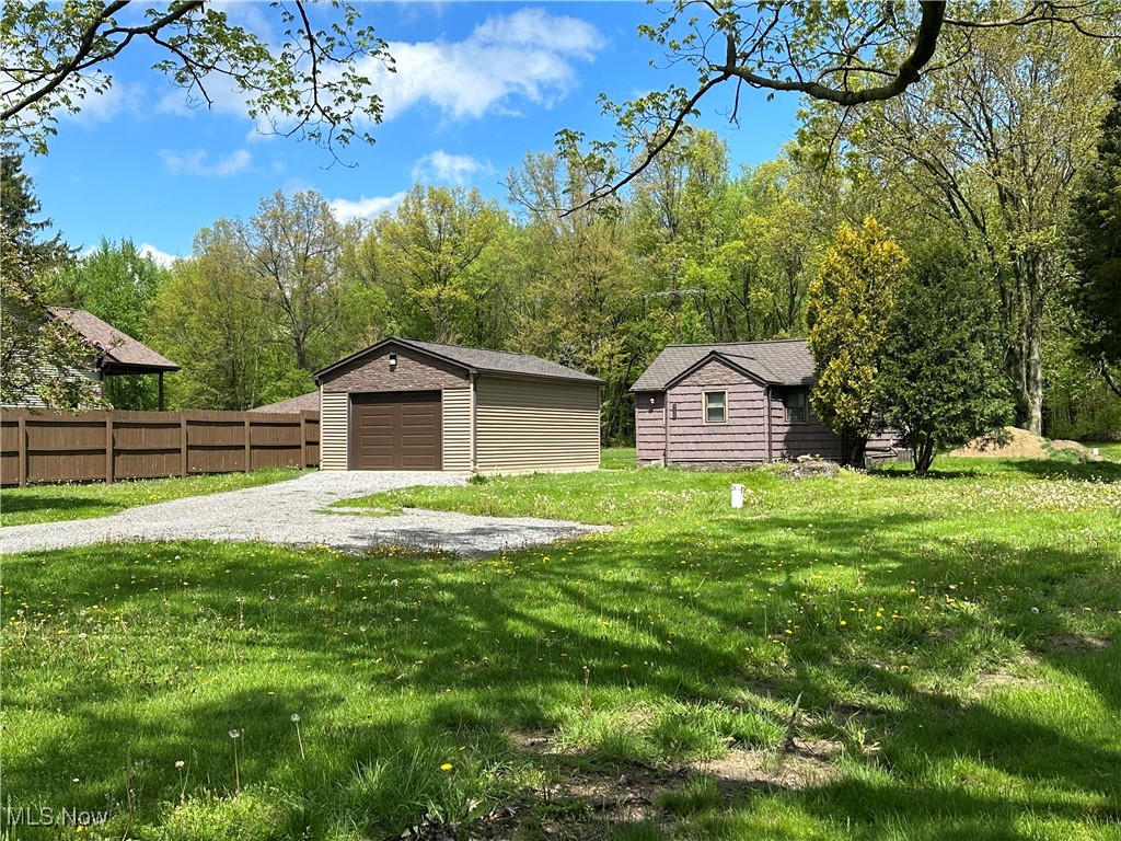 Welcome to your own slice of country paradise in the highly sought after Champion School District AND comes COMPLETELY furnished and ready to move right in! No reason to buy any furniture.......this has everything that you possibly could want in this two bedroom one bath slab ranch with around 3/4 of an acre! Country living at its finest! Your new garage is one and a half cars wide and extra deep for Dad‘s workbench, man toys, tools, or mowers. Your lot goes back extra deep and is great for your kiddos or pets to run and play for days without worry! The second you walk in your new home, it "POPS" with fresh paint, new vinyl plank flooring, and an open floor plan which today’s modern buyers want and need! Your kitchen is open to the rest of the home & has a small movable island which is excellent for cooking, prepping and serving dinners. Your new home is set up for entertaining and ready for a new owner! You get a sectional couch that is an awesome compliment to your open living room and your back bedroom has a Murphy bed which pulls out to make two beds so two could sleep in one bedroom. Seller has just installed a brand new septic system last year and the ground has just been seeded and passed Trumbull County Health Inspection! Your new home comes with all major appliances as well! Better book your appointment to see this country charmer before it’s gone in this hot sellers market. You could literally be living in this home in 30 to 45 days! What are you waiting for??
