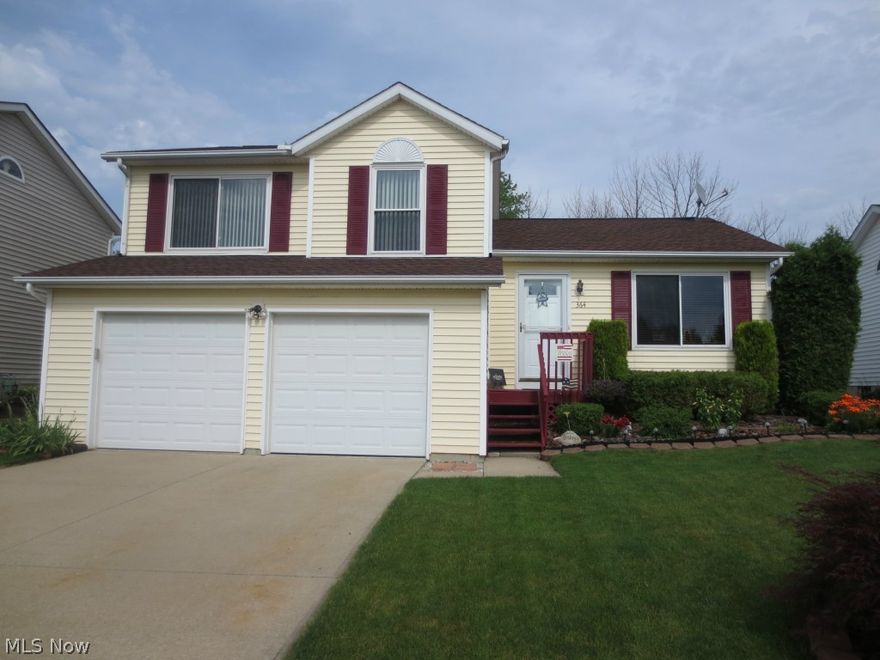 You will feel right at home the moment you step in to this meticulously kept newer 3 bedroom split level home.  Home is nestled on a quaint neighborhood street in the beautiful city of Medina.  Outside the home you will fall in love with the professionally landscaped yard, 2 car attached garage, rear patio, storage shed and fully fenced yard perfect for the kids and/or rover to run around and play. You will appreciate the open floor plan as you step inside to a soaring vaulted great room, eat-in kitchen with island and all new laminate wood flooring.  A few steps down you will be welcomed into the cozy family room with brand new neutral color carpeting. Master bedroom features a large walk in closet.  Finished basement includes a large rec room.  Many updates include flooring throughout, updated full bath 2015, new furnace 2011, new roof 2011 and newer champion windows.  Pride of ownership shows here!  All this plus you will feel confident and secure, home is being sold with a home war