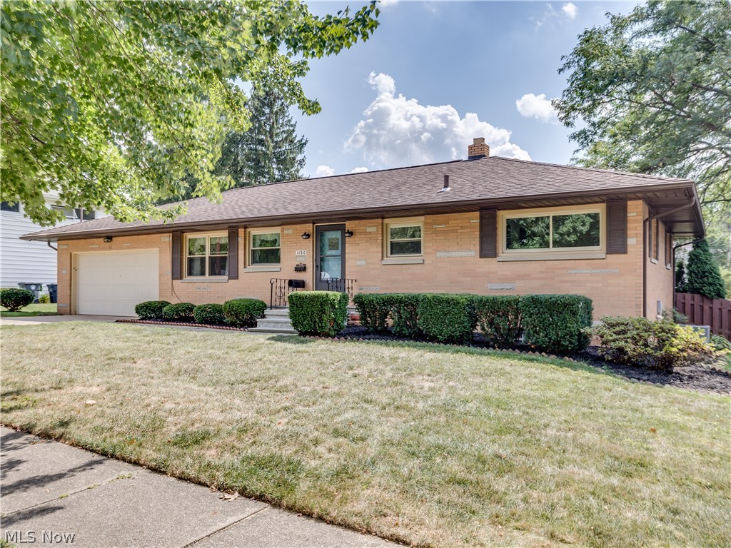 Phenomenal 2 bedroom, 2 bath brick ranch in the heart of West Akron nestled behind Stan Hywet Hall* This home has an attached 2 car garage with a fenced backyard with a covered porch and patio* After entering the foyer, you will see the light and bright spacious eat in kitchen with appliances (stainless steel refrig, range, oven), pantry, & ceiling fan with more than ample storage and counter space* Living room with wood like floors & Anderson windows looking over fenced backyard & access to covered porch & patio* Hallway to full bath and bedrooms has a large cedar closet* Master bedroom with wood floors & 2 cedar closets* 2nd bedroom with wood floors and cedar closet* Lower level has a finished rec room with glass block windows, full bath with new sink and utility/laundry room with washer & dryer* 2 car garage has nature stone floor, workbench area, storage & access to back yard* Roof approx. 8 yrs* Newer windows approx. 2009* Interior has been professionally painted, including lower