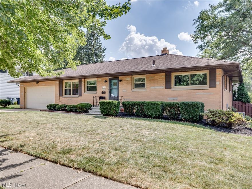 Phenomenal 2 bedroom, 2 bath brick ranch in the heart of West Akron nestled behind Stan Hywet Hall* This home has an attached 2 car garage with a fenced backyard with a covered porch and patio* After entering the foyer, you will see the light and bright spacious eat in kitchen with appliances (stainless steel refrig, range, oven), pantry, & ceiling fan with more than ample storage and counter space* Living room with wood like floors & Anderson windows looking over fenced backyard & access to covered porch & patio* Hallway to full bath and bedrooms has a large cedar closet* Master bedroom with wood floors & 2 cedar closets* 2nd bedroom with wood floors and cedar closet* Lower level has a finished rec room with glass block windows, full bath with new sink and utility/laundry room with washer & dryer* 2 car garage has nature stone floor, workbench area, storage & access to back yard* Roof approx. 8 yrs* Newer windows approx. 2009*  Interior has been professionally painted, including lower