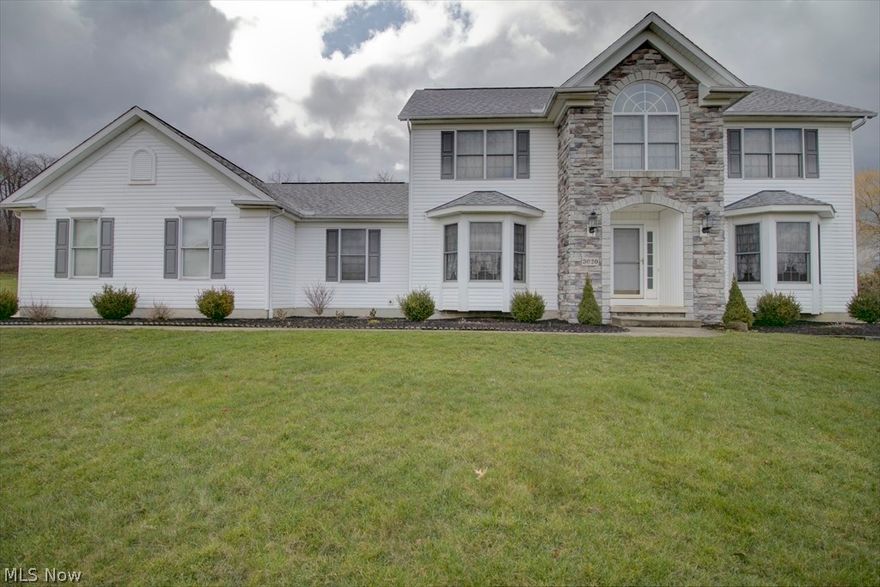 Wonderful Montville Lakes Colonial in the much sought after Highland Heights school district with 5 bedrooms, three full baths, a 3.5 car garage and one of the largest lots on this cul-de-sac with nearly an acre. The stone front entry way into a large foyer gives way to the lovely oak staircase, living room and the dining room with tray ceilings. The backside of the home boasts a large great room with a gas burning fireplace, a hugh kitchen with a dining area and glass sliders that lead to the stamped concrete patio, added in 2014. The first floor also includes the laundry area, a bedroom or office space and a full bath promoting a possible in-law suite. Upstairs are 4 more generously sized bedrooms, some with cathedral ceilings, and the master bedroom includes an ensuite bath with both a soaking tub and shower. Mrs. Clean lives here and I promise you'll be hard pressed to find a spec of dust! There is a full, unfinished basement with rough-ins for a bath and ready to be finished, if s