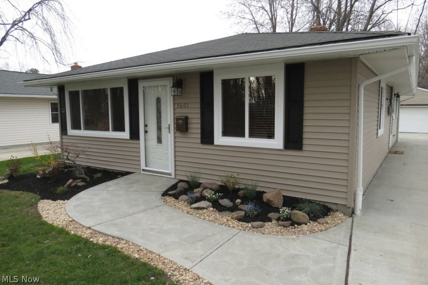 Beautifully updated throughout!  You may want to hurry to see this one- Nearly 1200 square foot, 3 bedroom, 1 1/2 bath ranch in Mentor-on-the-Lake. 
    As you enter through the quality newer front door, you will observe an open floor plan with a wonderful variety of neutral modern colors in the L-shaped living and dining rooms leading to a bright, remodeled kitchen.  Newer appliances include refrigerator, stove, and dishwasher.
    Ceramic tile floors accent the kitchen, 2 bedrooms, hallway, utility area, and both baths.  Rich dark laminate flooring enhances the living room, dining area, and main hall.
    All on the outside: 2 car garage, new drive, landscaping, partially fenced yard, newer windows, siding, gutters, and downspouts.
    Only a short walk or ride to Lake Erie and Mentor Beach Park, and a few minutes to Rt. 2 or I 90.