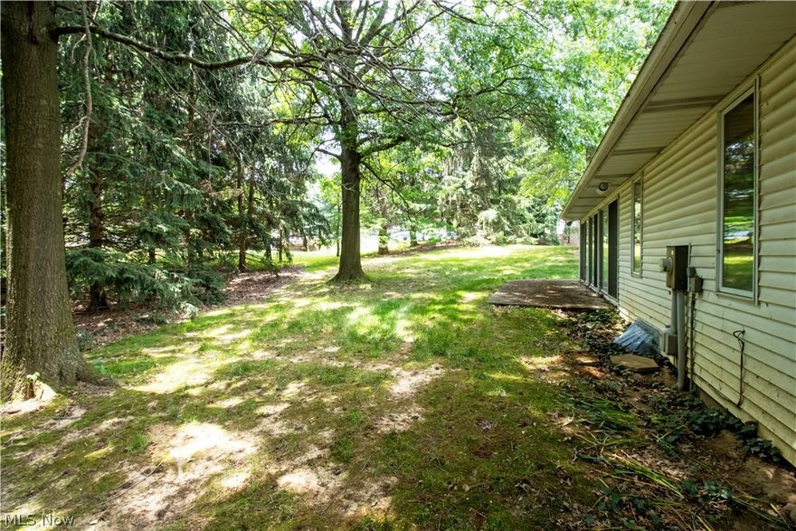 Great ranch home situated on a dead end street and near the college golf course. Open floor plan with the living room and kitchen that offers mullet cabinets with more than enough space and feature pull out drawers and soft close doors. Kitchen appliances were new in 2017 and will remain with the property. The spacious kitchen overlooks the living room which features cathedral ceilings with skylight, cozy gas fireplace and blinds from Nancy's Draperies. The living room walks out to a large three season room where you have fantastic natural lighting with the surrounding windows and double doors that allows access to the backyard and patio entertainment space. Additional updates include the furnace and central air conditioning units which were both updated recently as well. Large bedrooms with a nicely sized walk in closet in the primary bedroom. First floor laundry that offers cabinets for storage and utility sink along with the washer and dryer which will convey with the property. Outside updates include a professionally done landscaping wall and plenty of yard space with nearly a half acre to enjoy. This will not last long with this fantastic location and layout. Call your realtor today to schedule your personal tour.