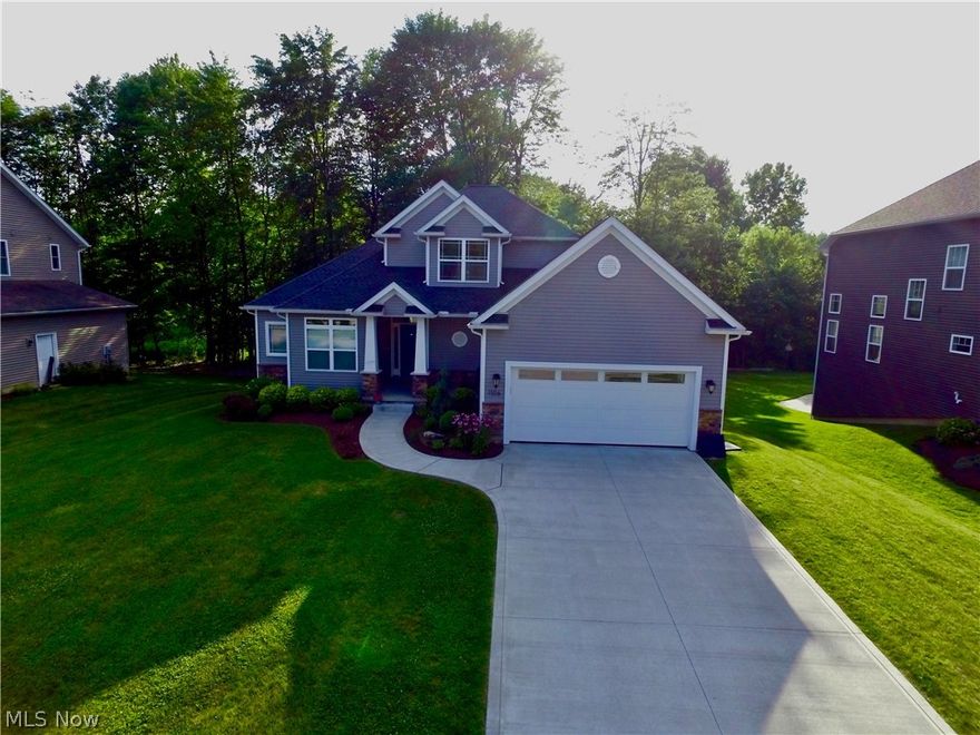 This beautiful 4 bed 3 bath Kent home is ready for its new owners! Featuring a first floor master bedroom and first floor laundry convenience is this homes middle name. Home owners will enjoy all the updates such as hardwood floors, stone fireplace and a master-bathroom with a lovely bath tub to soak your troubles away. This 2015 build includes a partially finished walk out basement perfect to make your way to the backyard for a cookout with friends and family. Located just minuets away from downtown Kent and Stow the new home owners will love their proximity to shopping and entertainment.