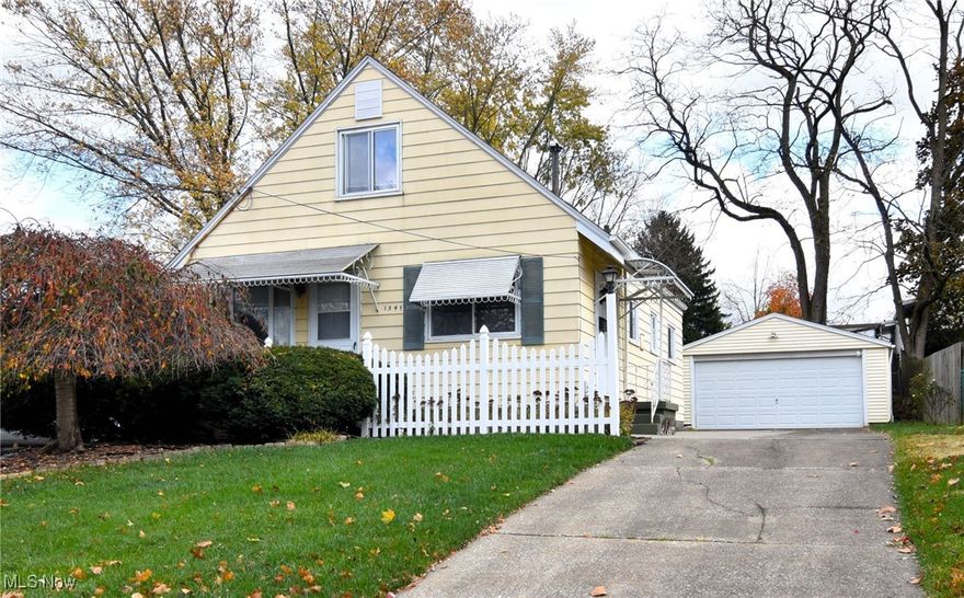 Step into this inviting bungalow, featuring a bright, open kitchen and a spacious dining area—perfect for family gatherings and entertaining. The main floor offers two cozy bedrooms and a full bathroom, providing everything you need for easy and comfortable living. Upstairs, a third bedroom adds versatility, whether as a guest room, home office, or quiet retreat. The partially finished basement offers additional potential, with a dedicated laundry area and plenty of space for personalization. Outside, unwind on the private deck that overlooks a fully fenced yard, providing both seclusion and room for outdoor activities. Plus, a detached two-car garage offers ample storage and parking space.  The furnace is less then 5 years old!