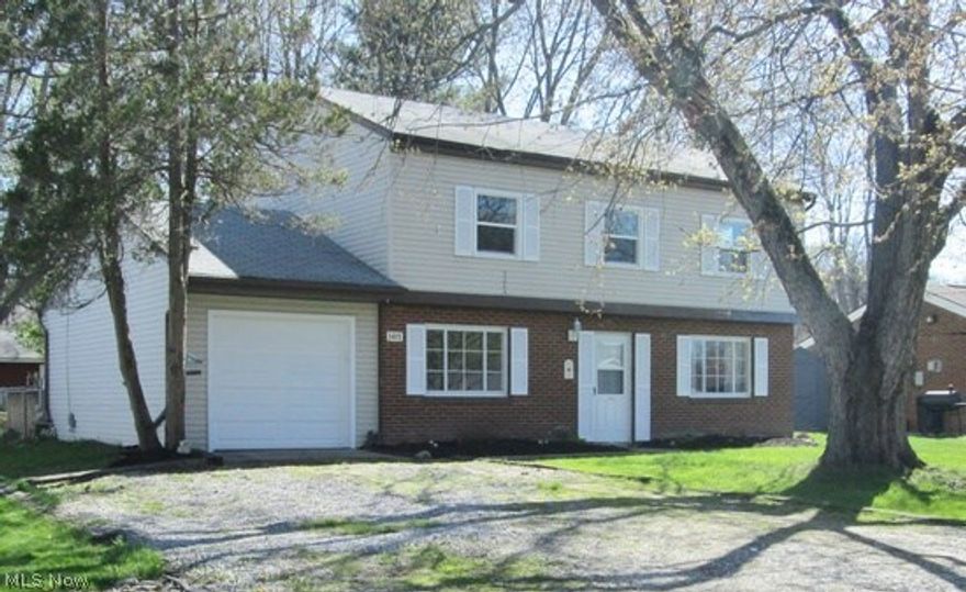 Located in Brimfield. Beautifully updated Colonial! All you have to do is move right in! Everything has been done for you! New carpeting installed, Freshly painted interior. Updated bathrooms. New windows & gutters. Updated electric, City sewer & water! The spacious kitchen (all appliances included) has a breakfast bar with a chalk wall perfect for homework time and is open to the roomy dining room. Also on the main floor is a huge living room, laundry room & a half bathroom. The upstairs includes a master bedroom suite with walk-in closet and full, upgraded bathroom, plus 2 more large bedrooms, another full bathroom & a cozy office!
Outside boasts a huge deck with a fully fenced-in yard, extra wide driveway & immaculate garage. New central air conditioner purchased, but not installed, is included. This is the only colonial in the neighborhood, it wont last long!