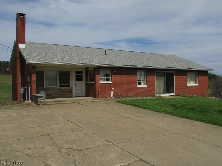 Investors check this home out. Nice floor plan. Solid brick home with 3 Bedrooms, 2 Baths. Needs some work. Gas hot water heat. Piedmont-Frontier Power-electric. Walkout basement-Solid brick masonry home. Gas royalties transfer. Property sells as is. Estate-no disclosures. Furnace @ 6-7 years old. Holding tank-2015.