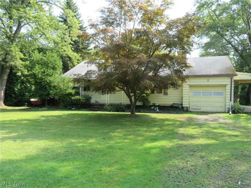 Adorable Three bedroom One and half bath ranch sitting on almost an acre.  Nice size eat it kitchen with plenty of cabinet space and has appliances.  Living room offers fireplace for those chilly nights.  Three bedrooms, one has a half bath.  Plenty of closet space.  Full unfinished basement. 
For all your big toys a 32 x 42 pole building with cement floor.  Come and take a look...