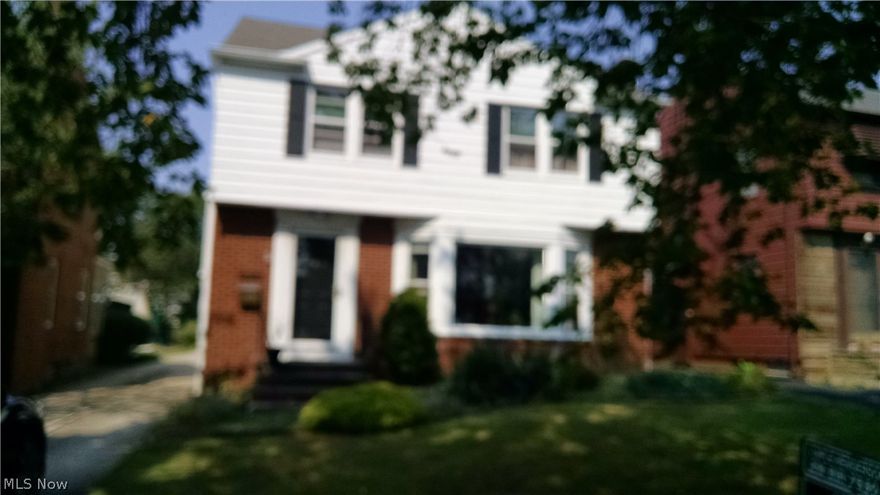 Just reduced for immediate sale. Move in condition. Very sharp well-kept home that is walking distance to shopping entertainment and restaurants. Traditional University Heights brick colonial with all brand new fresh paint, carpet and polished hardwood floors.  It also as an additional bonus room with ceramic tile flooring that would make a nice office den or library.  3 generous bedrooms 1 full and one half bath, full semi-finished basement. Entertain on the large deck and enjoy the 2 car garage. Kitchen has granite countertops with a separate eating area. Large living and dining rooms with beautiful bayed picture window, hardwood floors and a gas log fireplace. This is a Fannie Mae HomePath property that has special owner occupant incentives in place for a limited time. This special property qualifies for all types of financing even one that can include your dream list of your very own new stainless steel appliances.