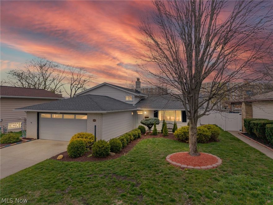 Welcome to this beautifully updated 3-bedroom, 2 full bath split-level home in Parma, Ohio. Move-in ready and thoughtfully renovated, this home offers a perfect blend of modern style and everyday comfort. Inside, you’ll find gorgeous updated flooring throughout the main living areas and a bright, spacious living room filled with natural light. The fully renovated kitchen (2022) is a standout feature, boasting granite countertops, stylish cabinetry, and a full suite of stainless steel appliances that all remain. Upstairs includes three comfortable bedrooms and two full bathrooms, providing plenty of space for family and guests. The lower level offers a cozy family room with a fireplace, perfect for relaxing, along with a large laundry area for added convenience. A sunroom adds versatile living space, ideal for entertaining, working from home, or simply enjoying the outdoors year-round. Step outside to a fully fenced backyard with a vinyl privacy fence (2020) and an additional concrete patio (2020), perfect for gatherings or quiet evenings. Additional updates include a new roof (2019) and hot water tank (2021). An attached garage completes the home. Conveniently located near shopping, parks, golf courses, hospitals, and more, this home offers both comfort and accessibility. Don't miss the oportunity to own this beautiful home!