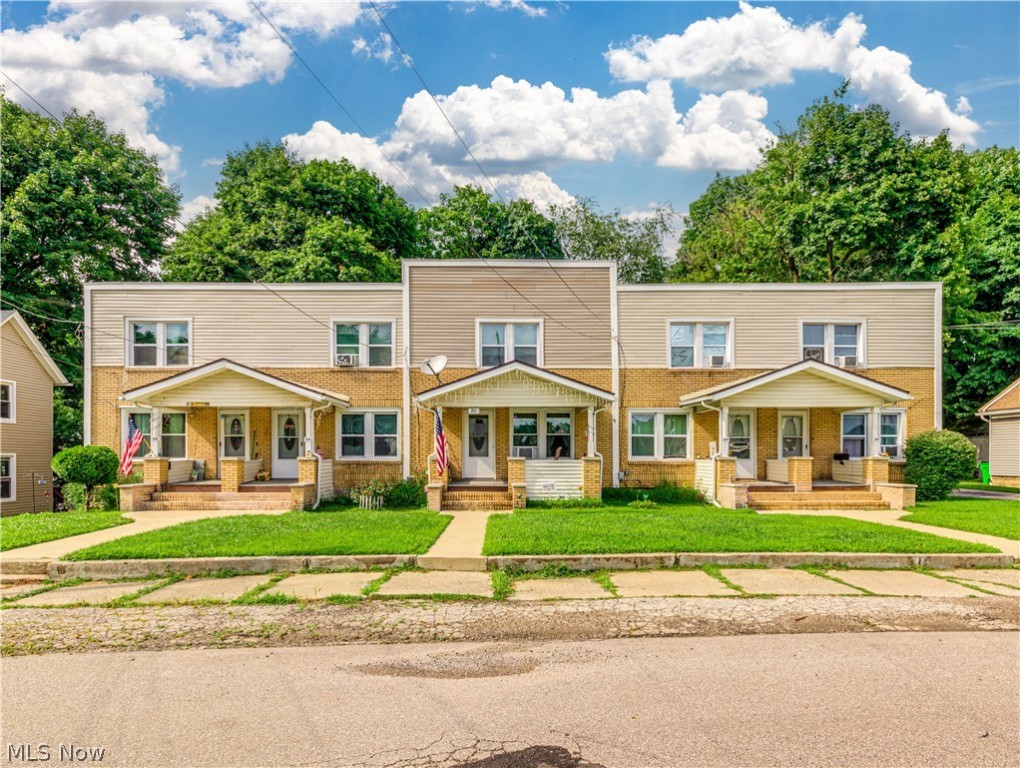 Total of 5 units. 3 units are 2 BR, 1 BA and rent for $650 a month. The 2 end units are 3 BR, 1 BA and rent for $750 & $725 currently. Tenants are on month-to-month leases. All units are currently rented and most have been long term tenants. Owner pays approx. $200 a month for water and $90 a month for trash. Large carport behind building, 1 space for each unit and additional parking available. Total of 2 parcels.