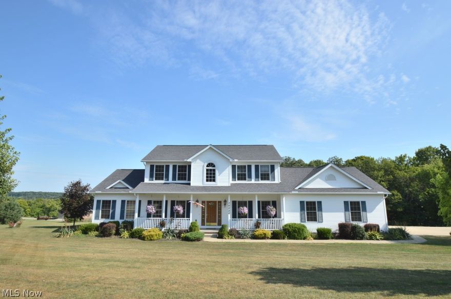 Stunning 2 story colonial nestled on 3 beautiful acres that features a garden, storage shed and barn perfect for the country living lifestyle! With beautiful landscaping and a large deck that features built in seating and hot tub and beautiful views of the Ohio country side. This home features hardwood floors through the dining room, great room that offers 18 foot ceilings. This open concept layout is perfect for entertaining and hosting the best gatherings! Ceramic tile, stainless steel appliances, and granite counter tops create a high functioning kitchen that would make any chef jealous. A half bath and large laundry room is off the kitchen and features 24 inch ceramic tile. Enjoy all of the beautiful seasons that Ohio has to offer from your all seasons room  which grants access to your back deck.  First floor master with walk in closet and Jacuzzi tub. State of the art water filtration system.