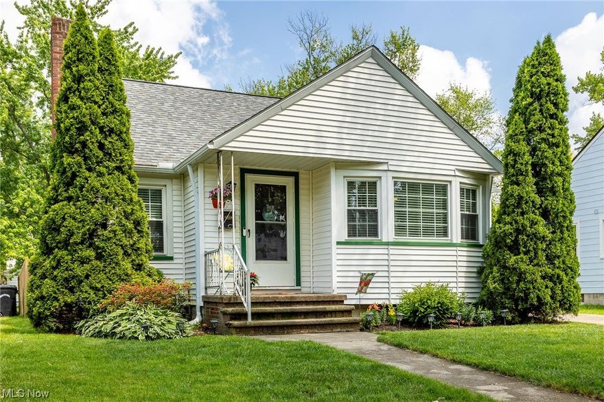 One look and you'll fall in love with this darling home! This Cape Cod home is a sought-after design, with two bedrooms on the main level, and an oversized second floor bedroom that could flex as a rec room, playroom, or home office. All bedrooms are carpeted and feature ample closet space. The living room features a gas fireplace, making it a great place to unwind after a long day. The updated full bathroom is conveniently located on the first floor, perfect for one floor living. The dining area is flooded with natural light and has a built-in bar cabinet for easy entertaining. The kitchen features an L-shaped counter and corner sink, strategically designed for the home chef. Outside, the backyard is private and fenced in, and features a detached two car garage set back to allow plenty of extra driveway parking for guests. This home also features a new roof and a one-year limited home warranty for peace of mind. Book your showing today!