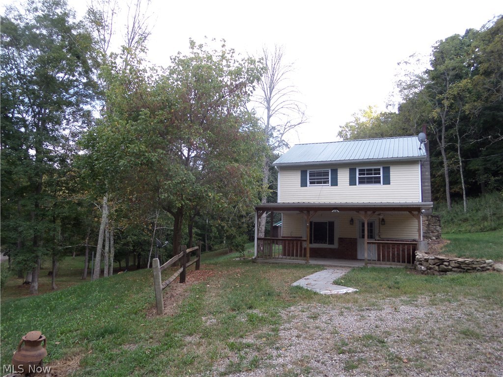 Have you ever dreamed of living in the country and having a creek in the yard and a large front porch to sit on and watch as the sun sets each evening? If so, this could be your home. Recently updated with a new bathroom and so much more. Outside you will find a 32x20 garage.