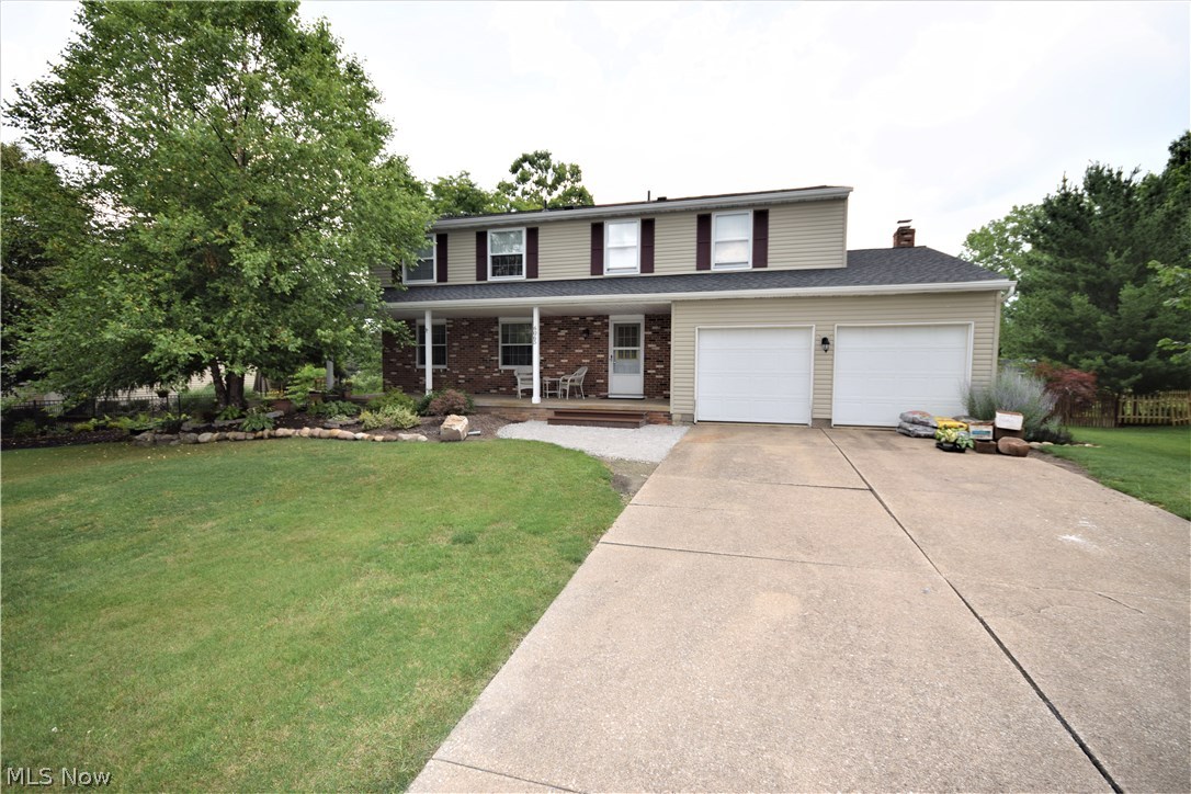A Rare Find! 2,152 sq ft Colonial on a half acre lot located on Lake Willow in Hudson! 4 bedrooms, 2.5 baths, dining room, living room and family room with fireplace! Master bedroom has a walk-in closet and master bathroom. The outdoor view is gorgeous as the property line is approximately 80 ft wide with 20 ft into the water! Sun room, fire pit, amazing front porch, fully landscaped and back patio with lovely landscaping looking out at the lake create a nostalgic vacation feel! Call today to schedule your personal tour of this home before it's sold!