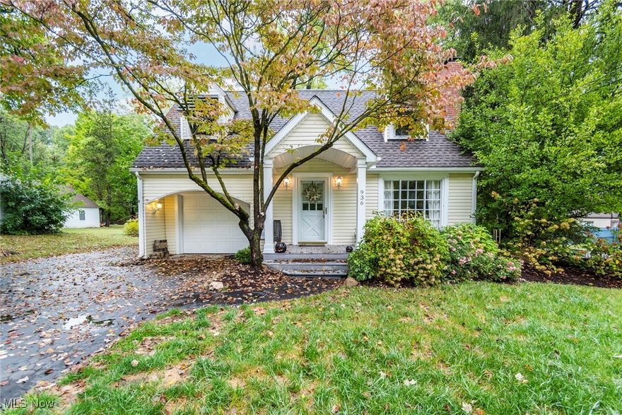 Are you looking for a home with classic charm, elegant updates and the backyard of your dreams? You've found it in this amazing two bedroom, two full bath Boardman showstopper. The inviting living room features a huge picture window for plenty of natural light, a cozy wood-burning fireplace, beautiful hardwood floors, and crown molding. The updated kitchen is a standout, boasting sleek quartz countertops, a stylish stone backsplash, and modern white cabinets, making it an ideal space for cooking and entertaining. The dining area overlooks both the living room and the breathtaking backyard for great views at every meal. Upstairs you'll find the primary bedroom with walk-in closet and the second bedroom with a stylish geometric wood accent wall. The full bathroom and linen and hall closet complete the upper level. The full basement has a versatile rec room with vinyl flooring, a convenient laundry area, and a full renovated bathroom featuring a walk-in shower. Don't forget to check out the built-in storage under the steps! Step outside to discover your private sanctuary, complete with a huge shed surrounded by vibrant perennials, a covered brick patio perfect for gatherings, and a firepit for cozy evenings under the stars. Recent updates include updated plumbing in both bathrooms, a new garbage disposal and newer roof and windows. Don’t miss your chance to make this move-in ready stunner your own!