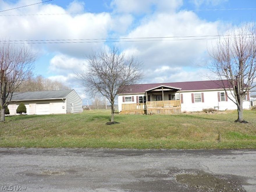 This is a Fannie Mae Home Path Property.  Country living among the roaming hills in this ranch style home. Spacious floor plan with eat-in kitchen, formal dining area, large living room plus three bedrooms and two full baths including master suite with attached bath. Front covered deck and rear open deck plus an oversized 3c garage complete this Wayne Township home in Columbiana County.   First-Time Buyers complete the Home Path Ready Buyer homeownership course.  Attach certificate to offer and request up to 3% closing cost assistance. Restrictions apply. Be sure to check out the Fannie Mae Home Ready Mortgage designed for owner occupant buyers, extended households with lower down payments