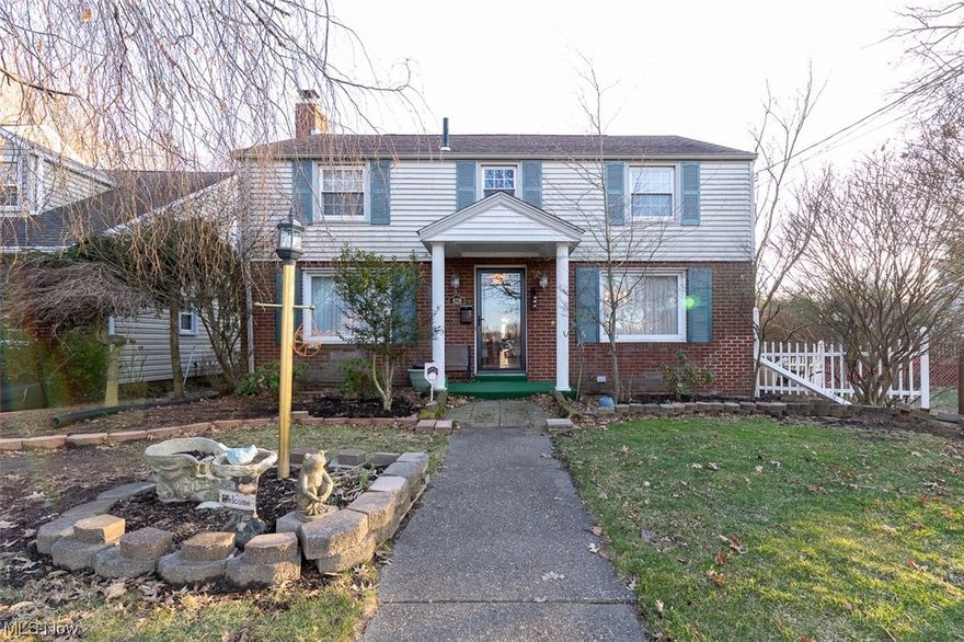 Please contact us for a personal tour of this beautiful home situated across from the entrance to Malone University. Its stunning curb appeal is enhanced by the myriad of trees, plantings, and seasonal decorations. The beveled glass entrance door, as well as the well-appointed kitchen and baths, add to the home's charm. The two-car garage is conveniently located on the side street, maintaining the home's dressy appearance. All window coverings are included, and carpets cover all living areas, including the upstairs bedroom. Don't miss out on the opportunity to see this lovely home in person. The water heater was replaced 2 years ago. The front screen door and the water softener is one year old. The roof and siding were replaced 10 years ago. For your peace of mind, there is a one year home warranty.