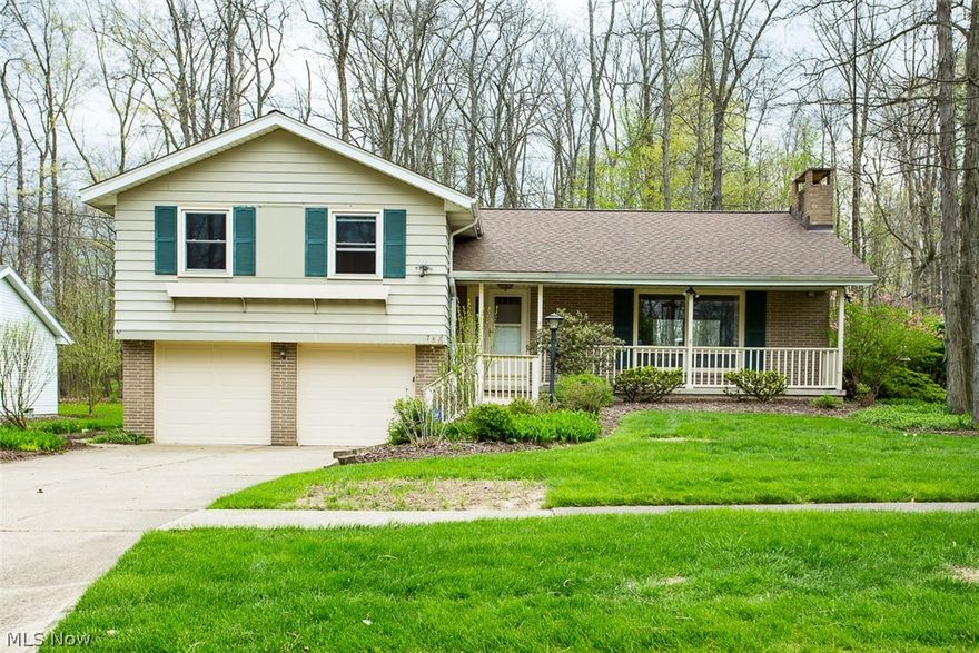 This Forest Meadows 4 level split sits on a double lot just under a half acre and has 3 bedrooms and 2 baths. It is within walking distance of historic Medina square and public schools. You will feel at home in the living room with plenty of natural light and a brick fireplace which opens up to the dining area. The eat-in kitchen has been updated with refaced cabinets, solid surface counter tops, LED lighting, and newer appliances in 2016 (Dishwasher, Microwave, Cooktop). From the kitchen walk out to the sunroom and watch the deer while enjoying your coffee. 3 spacious bedrooms all feature walk in closets and ceiling fans. The Master has its own master bath. The lower level has the family room, 1/2 bath, laundry and walks out to the back yard, The basement has a finished rec room and has a separate entrance located in the garage.  Newer windows throughout, newer electric panel in 2014, and new A/C unit in 2014.  Medina has that hometown feel, while still close to the Cities of Clevelan