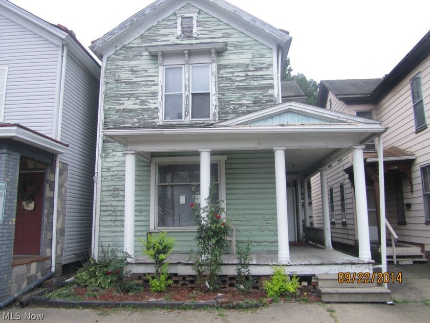 Looking for a home that won't break our budget? Look no farther.   This wood sided home is close to all amenities, has a covered front porch, and little view of the Ohio River from the upstairs rear of the home.  Proof of funds required with all offers.