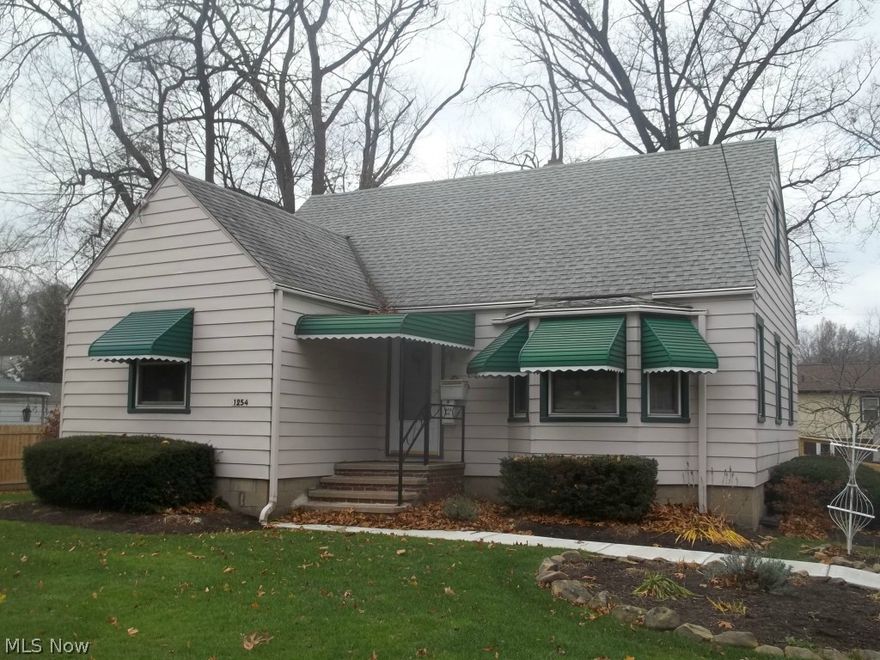 Welcome home in this well cared for home only minutes away from the Metro Parks, Cuyahoga river and highway. This home features plenty of space, newer replacement windows and roof. An extra room upstairs can be used as a 4th bedroom or office/playroom. Hardwood floors under the carpets will give you options for finishes. Lower level features an additional 300 sq ft rec room and the second bathroom with a shower. One floor living available and the home features a ramp for handicap accessibility. Great fenced in yard with a double lot has plenty of space to relax in the summer. Two car detached garage and solid driveway are great for the coming winter months.