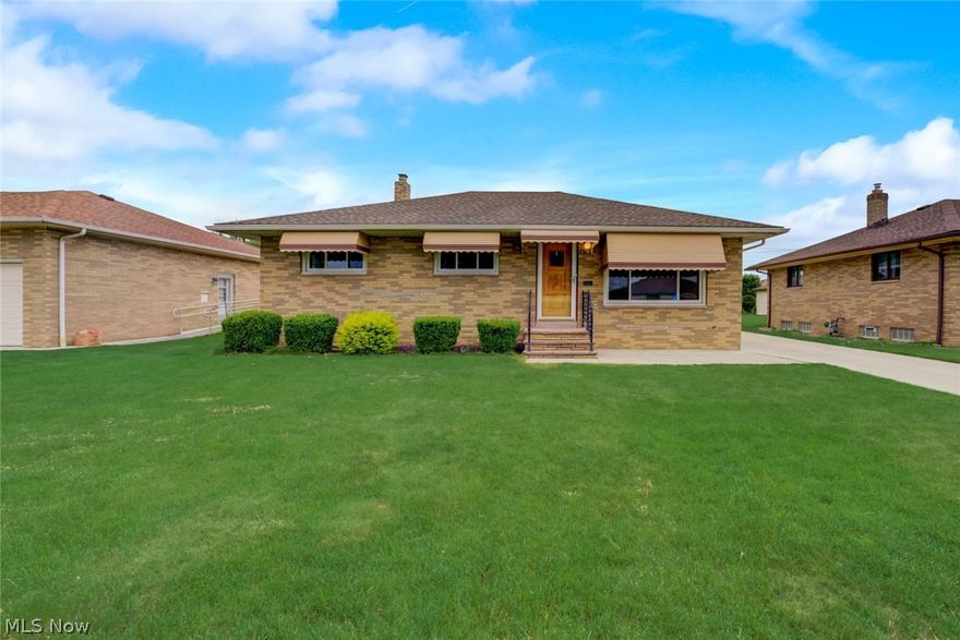 This Brooklyn one-story home offers granite countertops, and a two-car garage.