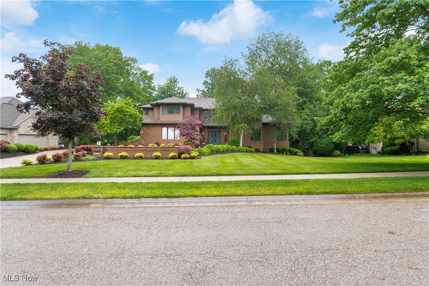 Custom-built, one-owner home on Nobles Pond, breathtaking water views Built with a contemporary flair and exceptional craftsmanship, with a soaring foyer entrance, custom walnut woodwork, an abundance of Pella windows beaming natural light. KitchenAid appliances and a butler’s pantry that connects to the formal dining room with custom downlighting creating ambiance for hosting. Unique centrally located wet bar wraps around the hallway across from the kitchen and leads into the stunning Great Room with a library wall, gas fireplace, and panoramic views of the pond through a full wall of UV-protected windows. Step out onto the upper-level Trex deck (2024), Highlights include Zoned HVAC,Rainbird sprinkler system, Security system (2025), Freshly painted exterior (2023). The lower level includes a half bath, three oversized storage rooms, a recreation area, and huge bonus room, Upstairs, the primary suite offers a retreat with double walk-in closets,corner fireplace, soaring ceilings, spa-like bathroom with two water closets and an adjoining laundry room for convenience. Two additional bedrooms are connected by a Jack and Jill bathroom, ideal for family living. A main floor office sits just off the hallway leading to the full bath, there is an additional laundry closet across the hall making this an ideal in law set up. The home also includes a residential elevator servicing both levels, blending accessibility with luxury. For the car enthusiast, the garage space is unmatched accommodating 8-12 vehicles with ease. Equipped with a grease pit, exhaust fan, Central vac system, CO sensors, and a compressor making this a dream setup for any automotive hobbyist or collector. Whether you're hosting guests or enjoying peaceful moments by the pond, this home offers luxury, comfort, and character—a truly special place to call your own.