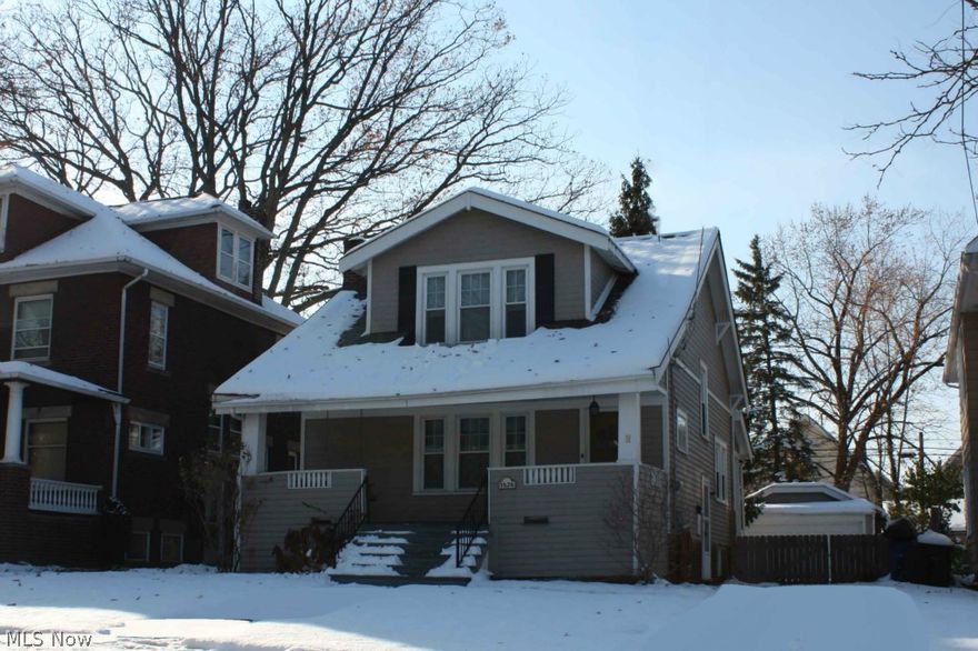 This adorable storybook colonial is ready for immediate occupancy and is updated with all of today's conveniences. The broad front porch is the perfect place to watch the world go by while cozied up on the swing. The living room is anchored by a fireplace while the entertainment sized dining room boasts twin leaded glass cabinets, a window seat and beveled glass french doors which lead to the 1st floor den. The bright and cheery kitchen has all of the appliances, custom cabinets, designer counters and carefree flooring. The master bedroom features twin walk-in closets and the other 2 bedrooms are equally comfortable with sizeable closets also. The 2nd floor three season room is the perfect place to relax while watching the sunset and the rec room is just perfect for casual entertaining or working out. All appliances are provided, including washer and dyer, updates include:replacement windows throughout, updated electric service, 2 car garage, fully fenced yard and much more.