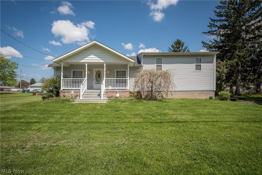 What a great find in Norton!  This 2, possibly 3 bedroom home has so much to offer both inside and out.  The charming front porch is a great place to enjoy the warm weather and country setting.  Step inside to the living room that has several windows for natural light as well as a gas fireplace and new carpet that continues into the adjacent dining room.  The kitchen is spacious with an abundance of cabinet and counter space plus a dinette with access to the deck and convenient full bath with linen closet.  Up a couple steps, you'll find a nice sized sitting area with a closet which could be used as a 3rd bedroom.  The larger bedroom features 3 closets, making it a perfect master and there's ample space in the 2nd bedroom.  The partial basement features a laundry room with appliances,  mechanicals including a new 200 amp service panel plus access to the 2 car garage with newer door and opener!  Outside is amazing and made for entertaining with plenty of room for everyone on the oversized deck that surrounds the 30' above ground pool with nearby koi pond.  The half-acre lot provides enough room for the kids to play while still having room for a garden with storage for lawn tools in the shed!  Absolutely move-in ready with neutral paint, new carpet, siding, windows, well pump and tank with keys at closing!