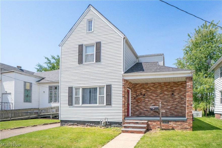 Charming and conveniently located near Downtown Massillon, this 2-bedroom, 1.5-bath home offers comfortable living space, a spacious yard, and great outdoor amenities! A covered front porch welcomes you inside to a bright living room with a large picture window and charming accents that lead into the family room/dining area, creating an easy flow for everyday living or entertaining. The eat-in kitchen features stainless steel appliances, charming cabinetry with elegant hardware. A convenient half bath completes the main level. Upstairs, you’ll find two nicely sized bedrooms, including one with access to the unfinished attic, along with a full bath featuring a dual-sink vanity, an updated countertop, and tub/shower combination. The unfinished lower level provides laundry, storage, and additional utility space. Outside, enjoy multiple lots, a fully fenced backyard, covered rear porch, extra yard space, and a 1-car garage with electric, water, heat, and a basketball hoop. A wonderful opportunity in a quiet neighborhood close to local amenities!