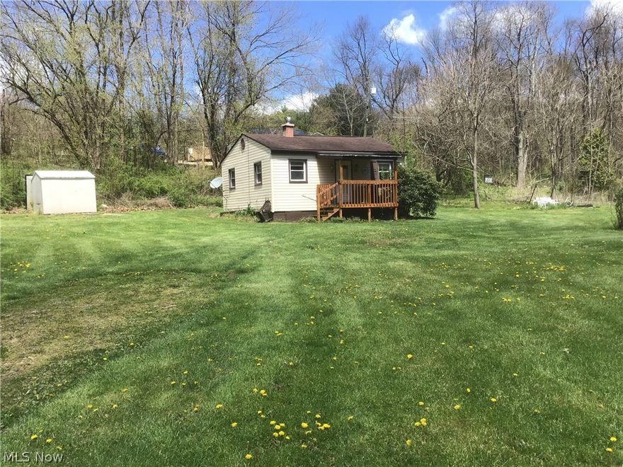 RARE LISTING!  level 1.5 ACRES OF LAWN AND MATURE TREES OVERLOOKING A 100 YEAR OLD STEEL BRIDGE CROSSING THE LITTLE BEAVER CREEK, IN THE DESIGNATED WILD AND SCENIC RIVER AREA.  Outdoor lovers a must see !