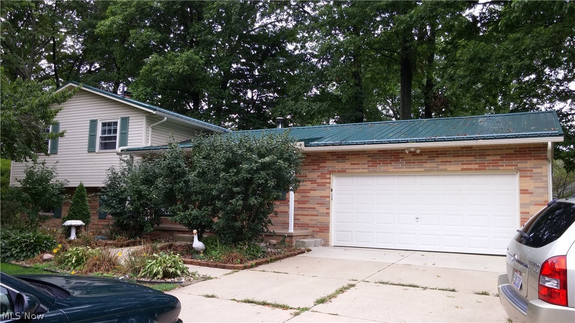 Gorgeous modern 3 or 4 bedroom home, Move in condition! Totally updated. Mostly hardwood. Beautiful kitchen with Granite counters and Slate tile floors, Oak hardwood in Living room and part of eat-in kitchen. Sliding door to large deck and large park-like backyard. 2 Full Baths. Priced correctly, will not be on the market long. New Lifetime Roof. We could go on and on and on this home, LED Lighting in kitchen, nice thermopayne windows. Landscaped. Partially finished basement. Office could be fourth bedroom, if needed. Additional family room with wood burning fireplace. Great opportunity. Call agent.