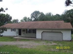 3 bedroom 1 bath ranch home in Licking Valley Schools. Home has an extra high unfinished basement for additional living and a walk-out basement to 1.33 acres of gently rolling land.