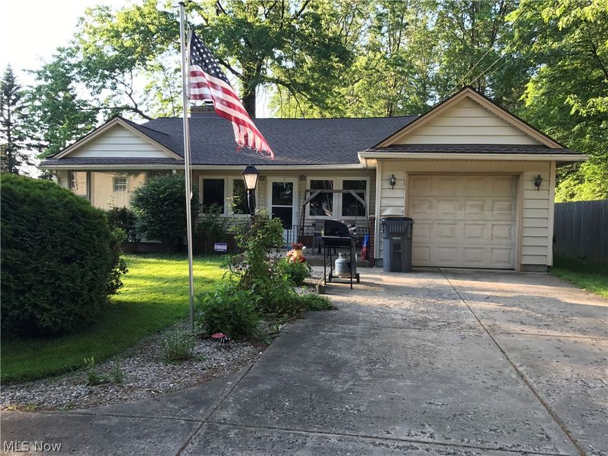 Well kept 3 bedroom home in Austintown!  Large enclosed front porch!  Spacious living room with wood burning fireplace.  Open eat in kitchen with appliances and formal dining room.  A few steps up to a raised level is the 3 bedrooms and full bath, and large storage closet.  The basement is unfinished with laundry room and plenty of storage.  Attached garage and plenty of parking.  Nice sized back yard with shed and side deck.  Newer roof.  Home warranty is rovided for worry free living.  Call today to schedule a private tour!