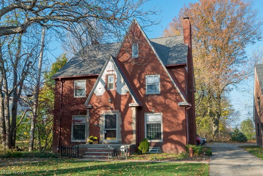 Live in luxury on desirable Lake Ave in Lakewood! At over 3400 sqft, this all brick 5 bedroom, 3 full, 2 half-bathroom home combines modern updates with historic charm. Quartz countertops, hardwood floors, newer appliances that stay and recessed lights are just a few of the highlights of the eat-in kitchen. Decorative crown molding flows through the formal dining room and the living room features a wood-burning fireplace. Oversized windows emphasize the beauty of the hardwood floors throughout. Cozy sunroom located off of the living room. All bathrooms have been remodeled including the exquisite main bath with soaking tub and tile shower with seamless glass doors. Enjoy the convenience of the 2nd floor laundry room fully equipped with a utility tub. The 3rd floor provides a private bedroom with full bath. Unique rooftop terrace provides a 20x20 space perfect for entertaining. The basement is partially finished with a half bath, glass block windows and waterproofing. Other improvements