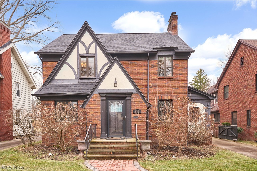 Gorgeous 4 BR 2.5 bath Tudor filed with updates just listed in West Akron's sought-after Castle Park neighborhood! New roof 2021, newer Pella windows, new gorgeous paver front walkway, semi-attached 2 car garage. Recently renovated kitchen with wood soft-close cabinets w crown molding, granite countertops, updated suite of stainless steel appliances, recessed lighting, hardwood floors & lovely original built-in china cabinet. Dining room w crown molding, tons of natural light & HW floors. Large family room flows off of dining room & feat. woodburning FP & HW floors. Front hallway w coat closet & original tile floor. Finished 3 season rm great place for an office or library. Head upstairs to large open & bright upstairs hallway w beautiful hardwood floors thruout. Master BR features nice closet, charming tented ceilings & amazing newly renovated master bath with heated tile floor, tile shower with granite slab floor, frameless glass door, niche & glass block window for great light while maintaining privacy. Marble-topped vanity & built-in for storage. 3 additional BRs very well-sized, all with HW floors & ample closet space. 2nd full bath with tub/shower combo with tile wall, travertine-topped vanity & ceramic tile floor. Many rooms just professionally painted. Unfinished lower level provides great storage. Concrete drive has automatic gate. Large fully fenced backyard with patio & above-ground pool. Don't miss this lovingly updated Tudor filled with charm on Melbourne Ave!