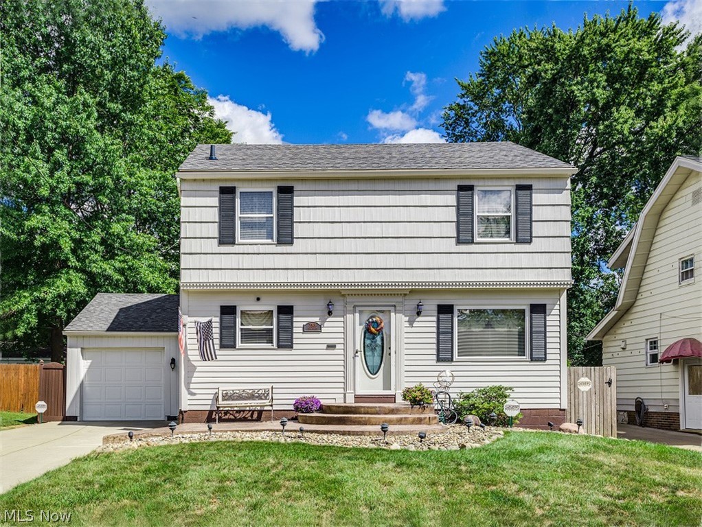 Rarely do you run across a truly special home like this. Move-in ready and located in one of Cuyahoga Falls’ premier neighborhoods, this 4-bedroom colonial has been home to the same family for nearly 30 years. As such, everything has been attended to as needed. You'll enter from a stamped concrete porch into a living room that is light, bright and has ample room for seating. You'll love the gleaming, eat-in kitchen. It features the appliances, including a gas counter top range, wall oven and good counter space for food prep. There are spaces for relaxing and entertaining, inside and out, too. The dining room flows from the living room in a special way that it will hold an extra-long dining table. The basement is a comfortable second living area, with a flex space that the owners used as a children’s play area, but could easily be used as a downstairs office/game room. The bedrooms are all good size. One is currently being used as an office with a full size desk! You will be amazed by t