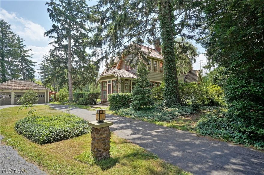 This Historic & cared for property, recognized as a historical landmark. Known as 'The Charles Alden Seltzer House" sits  on over 3 acres. Built in 1923 this home features gorgeous clay tile roof with new gutters in 2010, beautiful craftsman architecture, Gorgeous interior woodwork, including unique hardwood flooring & a stone fireplace with rock representing original 48 states. Lush acreage is loaded with evergreen trees and plants. There's a fenced orchard area with fruit trees & berries. Sellers added a solar power in 2020 plus a new elect. panel with grounding to code. Solar supplies energy for this property & part of a grid servicing the area. Front Porch & basement steps reconstructed.  Repaired & waterproofed front basement wall (2013), Blown insulation in attic, cistern repairs in 2015, New windows installed (2012-2013) Invisible fence in 2010, Gazebo reconstructed in 2015, Asbestos Remediation (2022) Home can be alternately heated with wood utilizing the outdoor wood furnace.