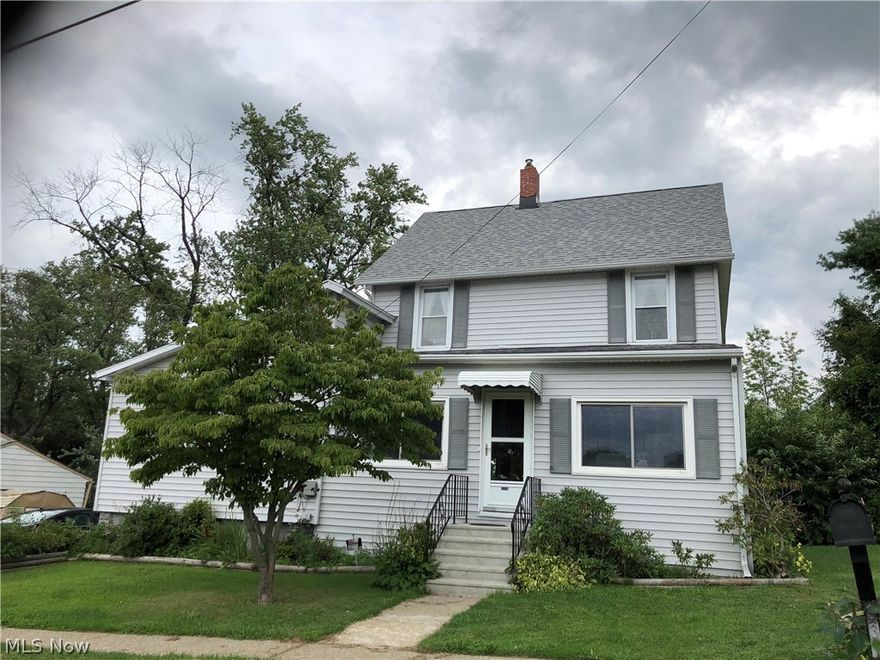 If you need a large home for a great price, then here it is.  This large 2 story colonial boasts 3 bedrooms and 1.5 baths plus a 4th bonus room that can be used for a bedroom, sewing room or office.  This home features a large eat-in kitchen plus large formal dining area.  The living room is huge. Upon entering this home, there is a large enclosed front porch leading into a foyer with a huge closet.  Updates include a newer furnace and central air, new roof and new hot water tank.  The basement has a finished computer room and has had waterproofing done.  There is a nice fruit cellar for great food storage.  Home is situated near schools, shopping and minutes from Lake Shore Park and boat ramp.  This is a lovely home and is waiting for a new family.