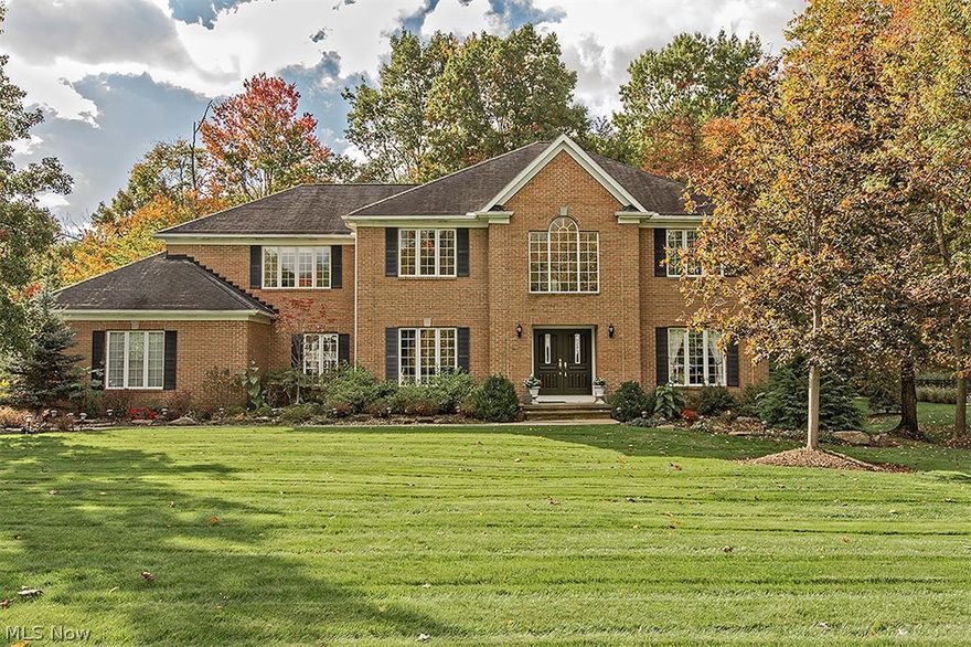 Live in upscale Chagrin Highlands in this immaculate brick colonial located on a beautiful cul-de-sac street. This move-in ready home has everything you can think of so pack your bags and call this place home. Enter the expansive two-story foyer with hardwood floors and be greeted by the formal living and dining rooms that are perfect for entertaining. The kitchen showcases newer stainless steel appliances, granite counters, hardwood flooring, a butlers pantry, and a large center island. The kitchen overlooks the family room, which features a gas fireplace and a built-in entertainment center. Adjacent to the kitchen and family room is a three season sun room offering a relaxing place to enjoy the wooded view. The main floor is completed by an office, a mud room/laundry room, and a powder room. Upstairs, retreat to the private and luxurious master suite with a large walk-in closet and huge glamour bath with double vanities, garden tub, and a skylight. Three more spacious bedrooms, all w