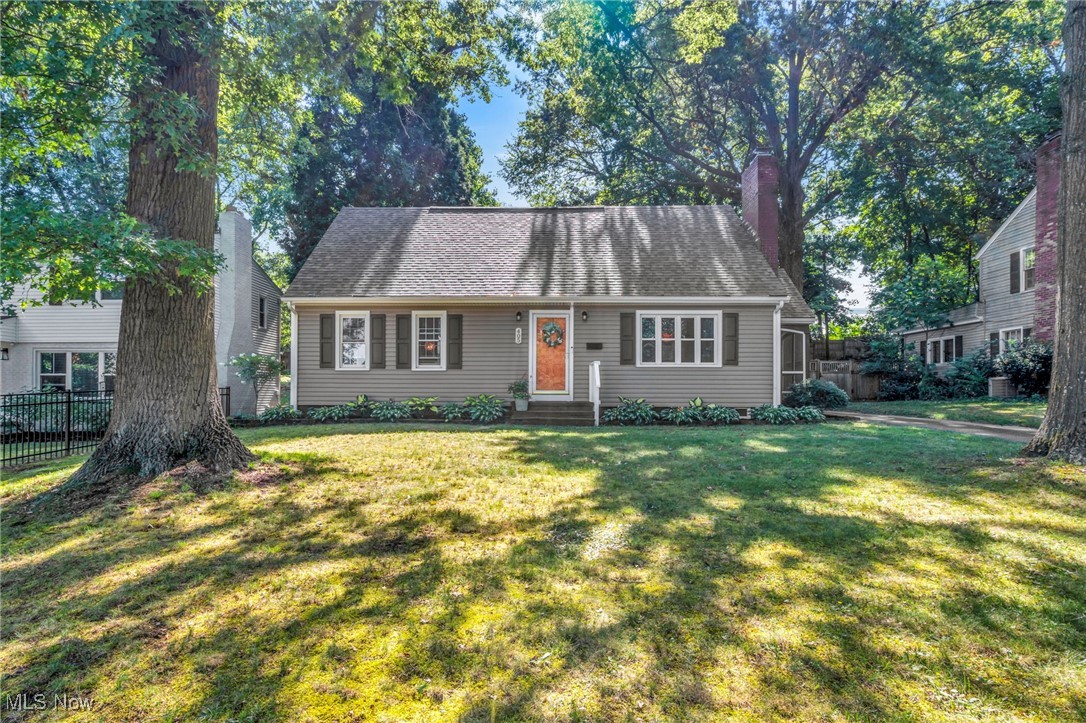 Welcome to this charming Cape Cod in West Akron, offering 4 generously sized bedrooms and 2 full baths. Inside, you'll find fresh paint and new light fixtures throughout most of the home and a cozy wood-burning fireplace in the living room. The kitchen is beautifully updated with stainless steel appliances, new espresso colored cabinetry, Corian countertops and LVP flooring to add to the aesthetic. The first floor bathroom features a relaxing soaking tub for unwinding after a hectic day! The second floor primary bedroom includes 2 closets for ample storage space. Enjoy outdoor living in the newly painted screened in porch plus a spacious 2-car detached garage. A brand new roof on both the home and garage was just installed in July 2025 and has a transferrable warranty upon successful closing. The large basement (with a second wood-burning fireplace) offers great potential for additional living or entertaining space and also carries a lifetime warranty! Located just steps from pet-friendly Schneider Park with a walking trail and close to dining and shopping, this gem offers comfort, charm and convenience all in one!