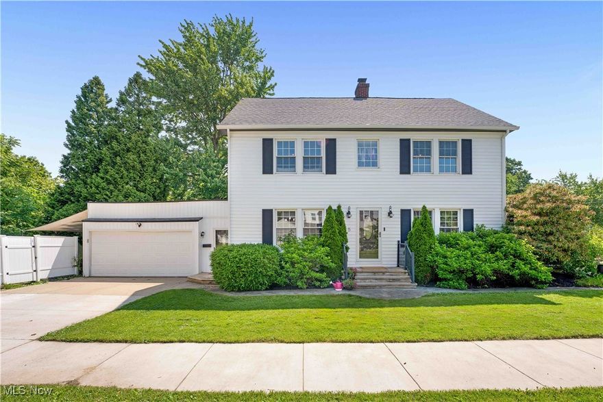 Welcome home to 685 Ecton Rd., a charming, beautifully updated 4-bed, 2.5-bath Colonial located on the corner of a dead-end street in a lovely, quiet neighborhood in NW Akron. Enjoy the home's vibrant landscaping as you follow the walkway, etched w/a fun surprise, to the front door. Upon entering the home & stepping into the foyer, 2 tremendous arches on either side welcome you, each opening to the LR & DR & both filled w/an abundance of natural light. To your right is the massive LR w/newly updated electric FP w/marbled tile hearth & surround & corbeled mantel, built-in floating shelves, & built-in lower cabinetry for storage. From the LR, access the fantastic sunroom w/built-in shelving. To the left of the foyer, the generous dining rm w/charming built-ins & large floating shelves is perfect for entertaining guests & is open through another archway to the sizeable kitchen. Don't miss the delightful built-ins on your way! The kitchen has plenty of updated cabinetry & countertop space & houses SS appliances. Completing the 1st floor is an updated full bathroom w/brass accent features. On the 2nd floor, you'll find 3 generous BDs with W/I closets & the other  with dbl closets. The bedroom at the top of the stairs has an adorable window bench w/built-in storage beneath & built-in shelving on either side. Both 1.5 bathrooms on this floor have been updated, & the full bathroom has a nice, open space w/hooks and shelving for additional storage. You'll find the 4th bedroom w/built-ins & the bonus loft space with W/I closet & shelving on the 3rd floor. The basement, though unfinished, has tons of space for storage & provides fun possibilities. Enjoy the peaceful fenced-in yard on the brick-paved patio, by the stone firepit, or in the grass under the shade of a tree. Being only minutes from several parks, amenities, food, and entertainment, this home's location is a dream come true! Schedule your showing today!