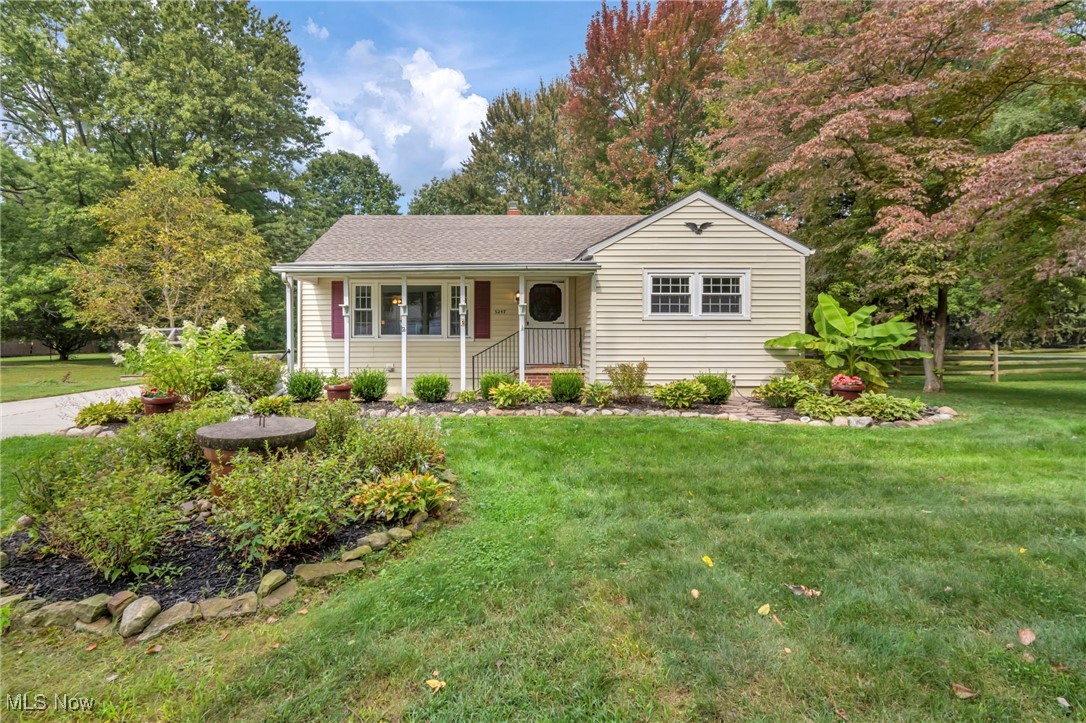 Welcome to modern living with country charm on nearly an acre in Madison! Located minutes from Madison's sought after parks and the lake, including private access to North Perry beach club, enjoy everything this wonderful city offers in an unbeatable location! Enter inside to find bright, inviting interiors with tasteful finishes. The kitchen is lavishly updated with modern cabinetry, sleek black granite countertops, and newer appliances and opens into the dining room with plenty of space for entertaining! The living room has gorgeous hardwood floors and offers beautiful views of the landscaping. A personal favorite is the 18 x17 master bedroom, currently used as a family room, that offers a fully updated ensuite bath, double wide closet, and a new sliding door that exits to the covered porch- assuring the perfect morning to wake up and have a cup a coffee on! There are two more bedrooms and a full bath on the other side of the home, offering privacy and retreat. Each one offers nice size rooms and double wide closets! The full bathroom conveniently has a walk-in shower and a newer vanity. The full basement offers plenty of storage and endless possibles to be turned into a recreation space, home gym or your desire. The laundry is also located in its own area, and you'll find lots of built in cabinetry for more storage! Just wait until you see the oversized garage with a finished loft and Brown's Bar - an entertainer's dream! To top it off, the park-like backyard is filled with lush trees, tasteful landscaping, and two sheds - making you adore this home even more! Important upgrades to also note, roof is relatively young, vinyl windows, new electrical sub panel, glass block windows, invisible fence, Well tank, 2019 HWT, furnace & AC. Imagine fall nights under the stone pergola, deck, or the new concrete patio admiring the home and life you love. This lovely ranch is designed perfectly, and you must see it in person to appreciate everything it offers, schedule today!