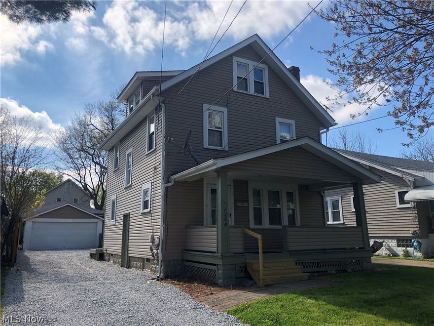 Hello Everyone!  Here is yet another wonderful purchasing opportunity in Akron's own Firestone Park!  This 3 bedroom colonial has tons to offer its new owner including~ a formal dining room, brand new carpet throughout, nice size front porch-perfect for spring summer and fall sitting, vinyl siding, detached 2 car garage, applianced kitchen (including refrigerator-dishwasher and stove), a full finished attic could be a office, man cave or 4th bedroom, full basement, back deck, clean basement and a Home Buyers Warranty is being offered!  Call Today This is a must see!!