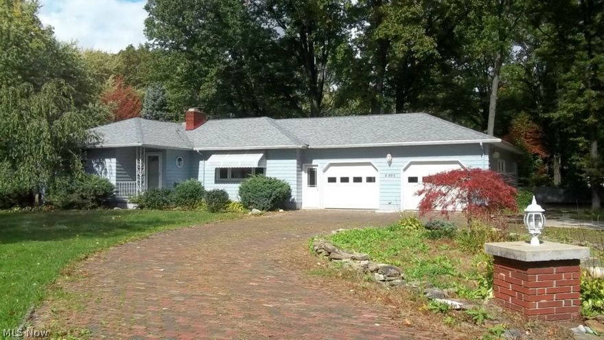 Great Howland location with extra large yard.  This 3 bedroom home needs some TLC but has some nice features which includes an updated kitchen with stainless steel appliances, a movable island, an extra large custom built patio off the sun room, extra large garage space, circular brick driveway Check it out yourself. Located in an area of higher priced homes. There may be a possibility, at this time, to separate the property and sell one of the parcels for a building lot.  ($25,000)