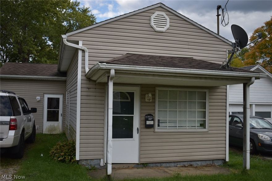 Charming bungalow with close proximity to Ravenna's city center.  1 Bedroom ranch with living room, dining room, Kitchen and full bath with attached laundry. Tax records indicate 2 bedroom and seller states dining room was used as another bedroom with a closet, but would be a walk- through room. Kitchen offers built-in hutch and appliances. Front porch and back patio offer outdoor seating spaces.  Nice size back yard and driveway for parking. Shed on property; can not guarantee it's condition. Have your own home, better than apartment living!