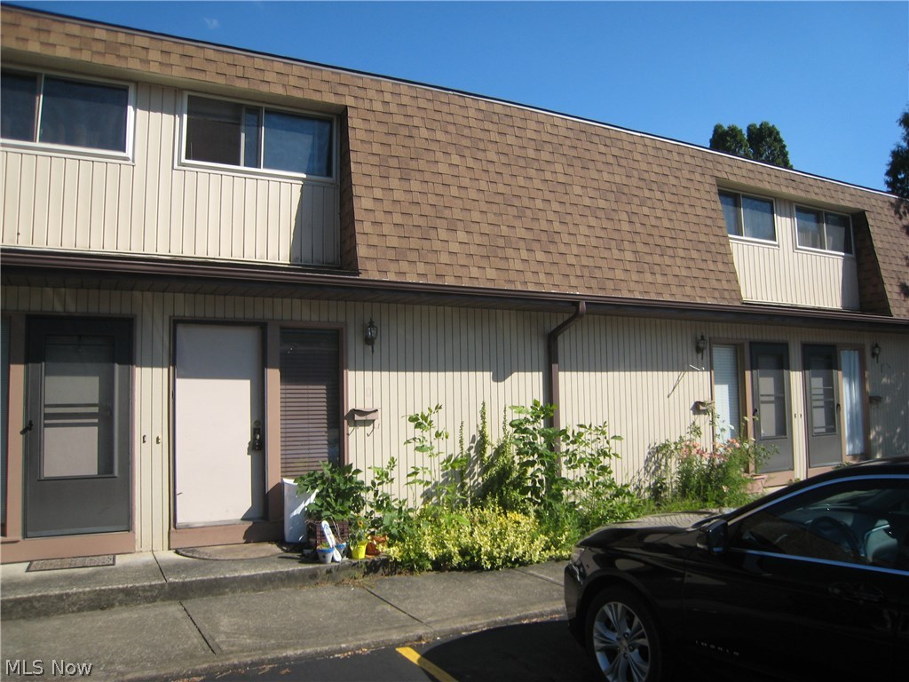 Great location only mile away from Kent State stadium. Move in or purchase as a rental. Main level features open floor plan and a half bath. Sliders lead to back patio. Two bedrooms on second floor with full bath. Full basement could be used as a rec room and/or storage and laundry. Assigned parking and plenty of extra guest parking.
